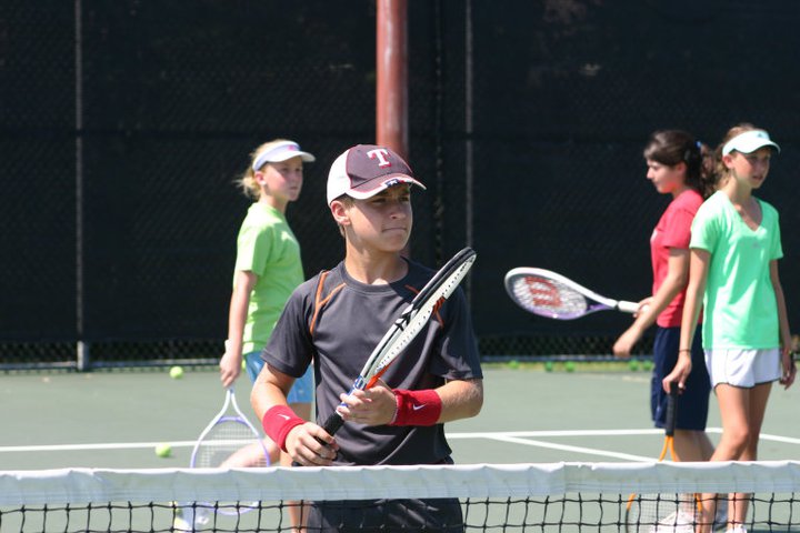 Kids playing tennis